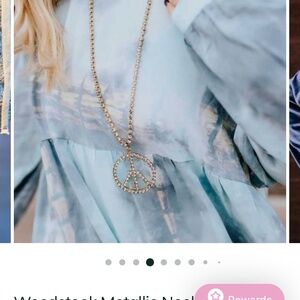 Stunning brand new Tova gold Peace necklace